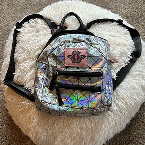 Dolls kill Dan pak iridescent small water pack- bladder bag not included